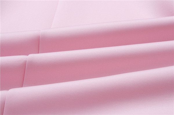 Stílusos női mellény, rózsaszín V-nyakkal