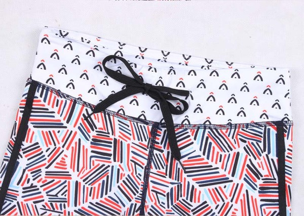 Színes női leggings nyakkendővel és oldalsó szegéllyel