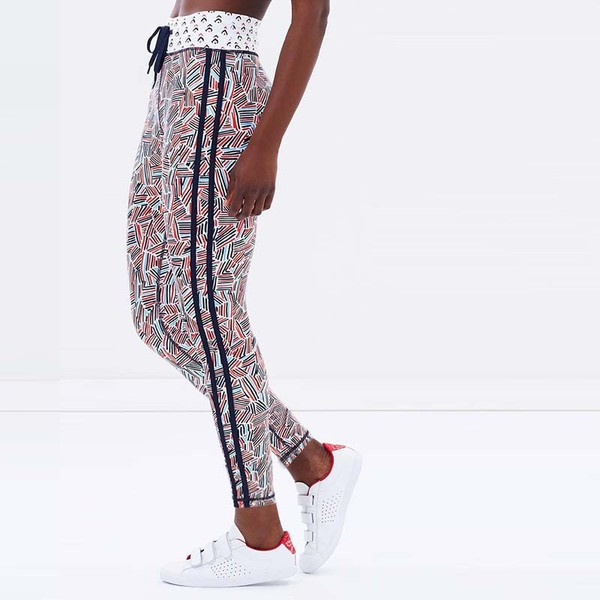 Színes női leggings nyakkendővel és oldalsó szegéllyel