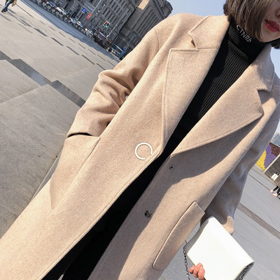 ÚJ Stílusos női kabát hosszú modell V-alakú gallérral több színben