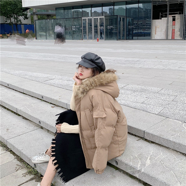 Modern női kabát kapucnival öt színben