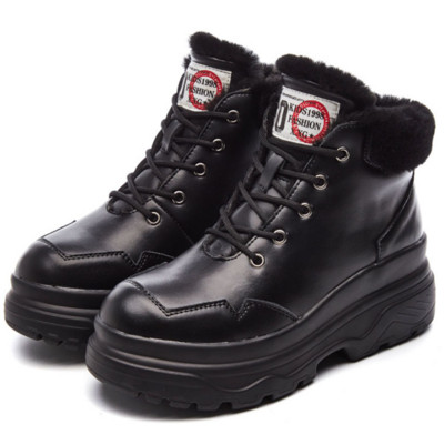 Meleg és kényelmes női téli cipő fekete-fehér színben