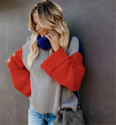 Új modell női színes pulóver pólógallérral és széles ujjakkal