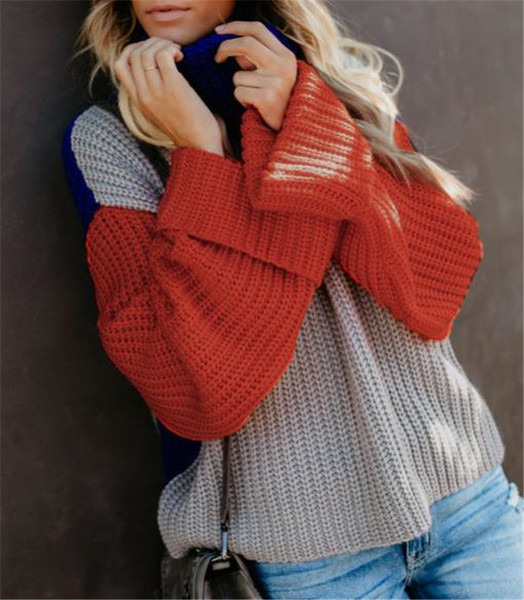 Új modell női színes pulóver pólógallérral és széles ujjakkal