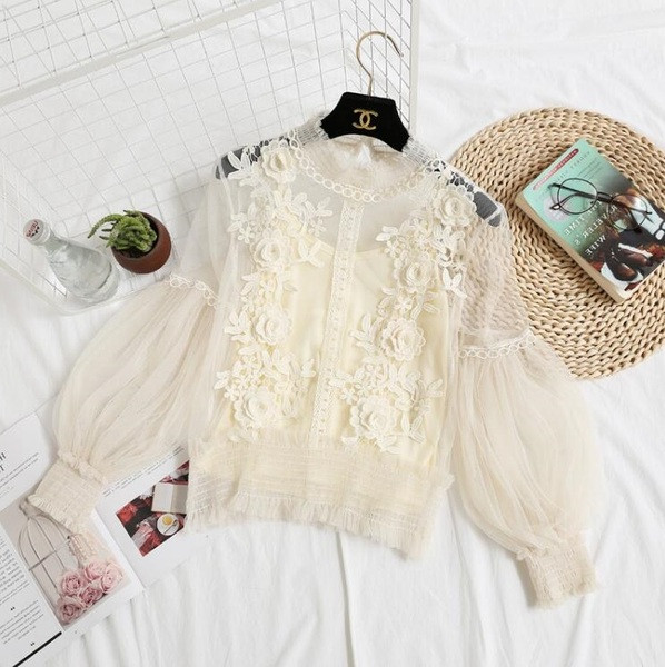 Stílusos női blúz átlátszó ujjakkal, négy színben