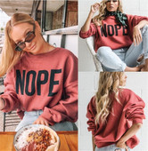 Sport-alkalmi női blúz felirattal