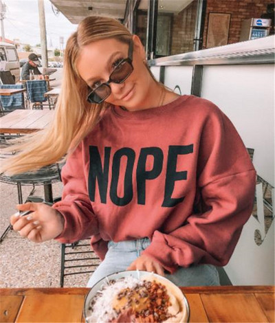 Sport-alkalmi női blúz felirattal