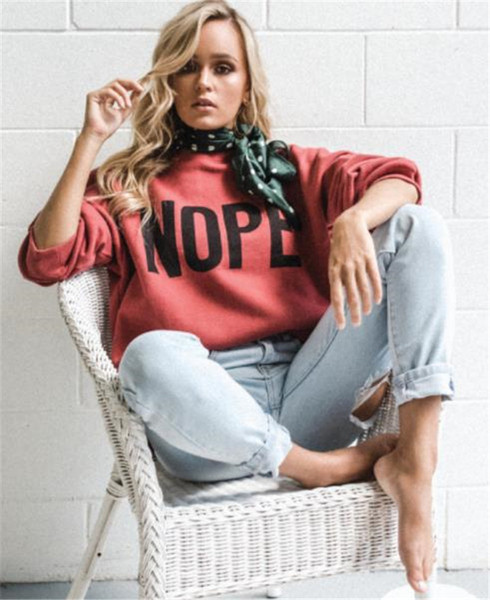 Sport-alkalmi női blúz felirattal