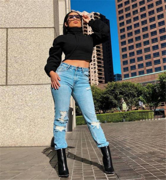 Modern női blúz rövid modell fekete ujjú gumival