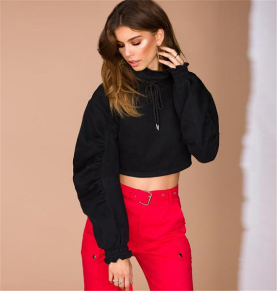 Modern női blúz rövid modell fekete ujjú gumival