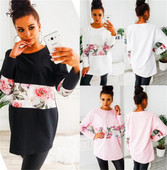Modern női alkalmi blúz fehér, rózsaszín és fekete virágos motívumokkal