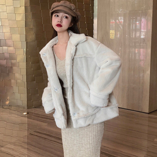 Női pehelykabát fehér színben