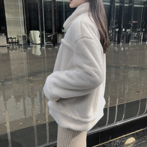 Női pehelykabát fehér színben