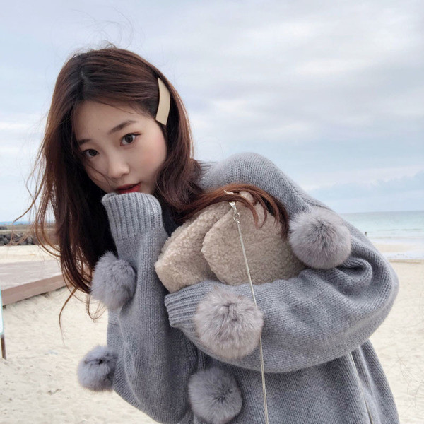 Téli alkalmi női pulóver szürke színben