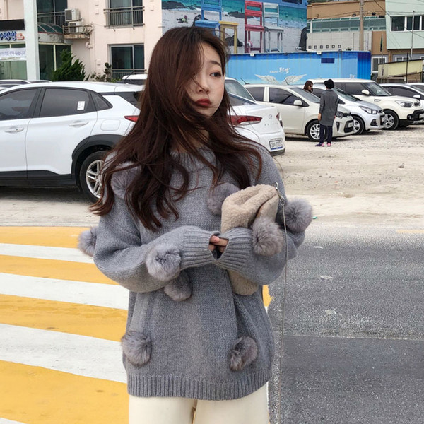 Téli alkalmi női pulóver szürke színben