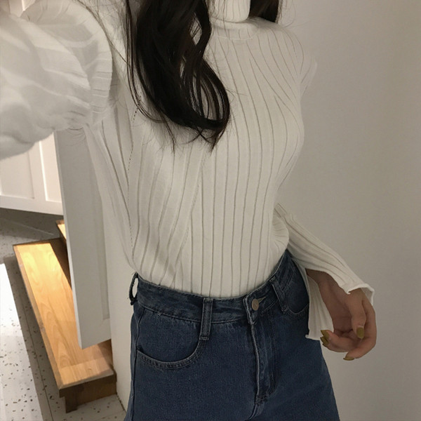 Női pulóver magas gallérral több színben