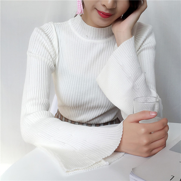 Női pulóver O-nyakkal és lótusz ujjakkal