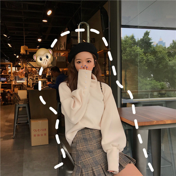 Μαλακό πουλόβερ κυρίες με κολάρο με πόλο και κουμπιά στα μανίκια σε μπλε και άσπρο