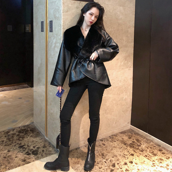 Új modell eko bőrből készült női kabát fehér és fekete pehelyszínnel