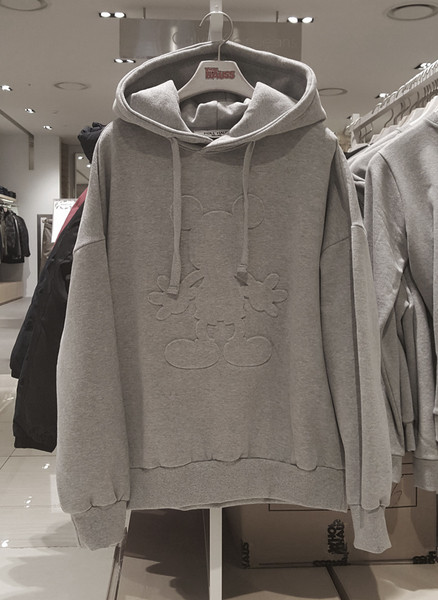 Női hosszú ujjú pulóver és kapucni fekete és szürke színben