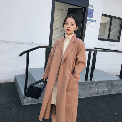 Stílusos női kabát hosszú modell zsebekkel, két színben