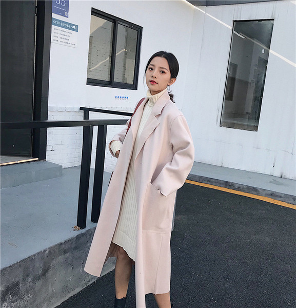 Stílusos női kabát hosszú modell zsebekkel, két színben