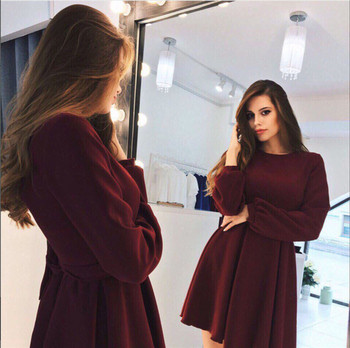 Модерна дамска рокля разкроен модел  в черен и червен цвят