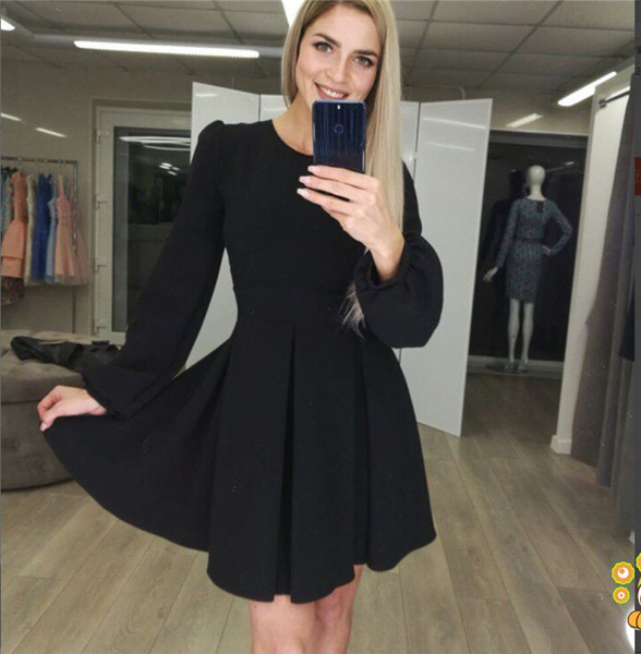 Модерна дамска рокля разкроен модел  в черен и червен цвят 