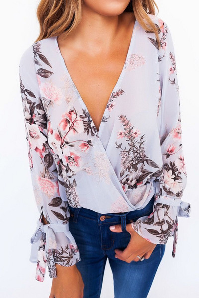 Bluză de damă elegantă cu model floral și legături la mânecă