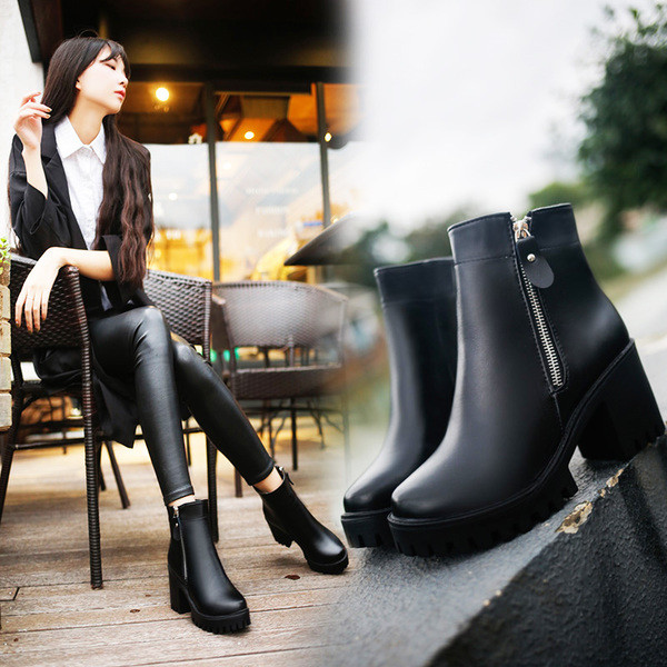 Modern női csizma fekete színben, cipzárral