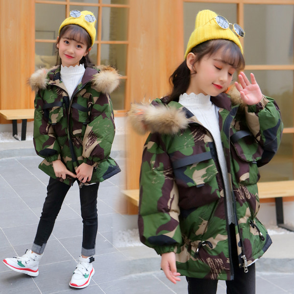 Téli gyerekdzseki terepszínű mintával zöld és lila színben