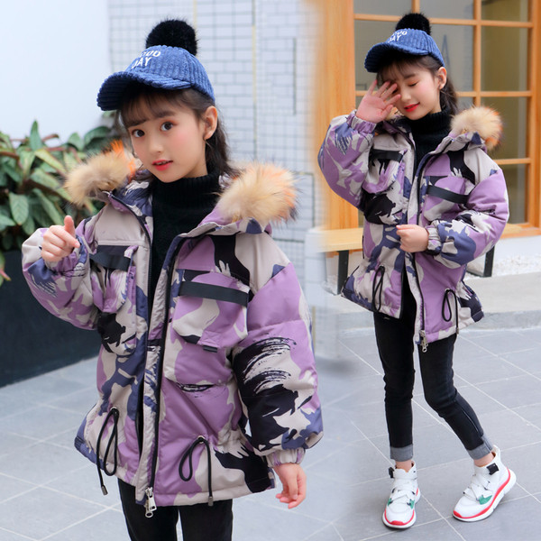 Téli gyerekdzseki terepszínű mintával zöld és lila színben