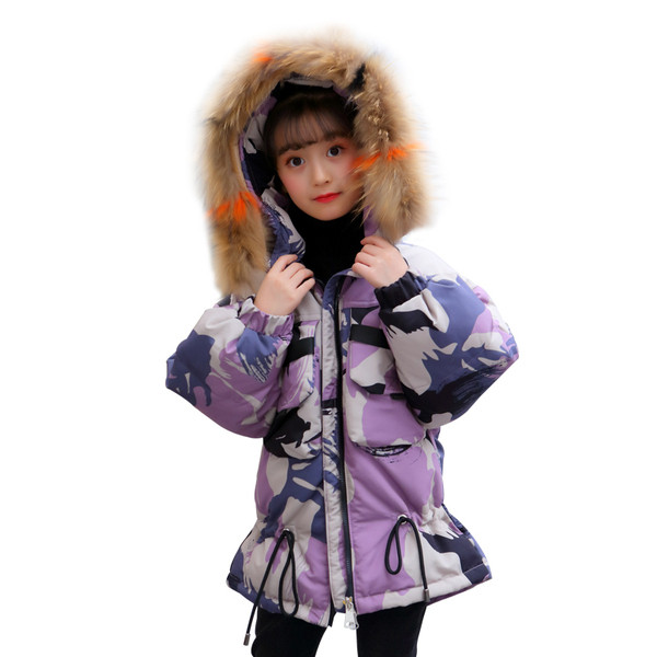 Téli gyerekdzseki terepszínű mintával zöld és lila színben