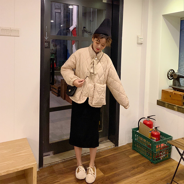 Μοντέρνο γυναικείο μπουφάν με κορδόνια και μεγάλες τσέπες σε δύο χρώματα