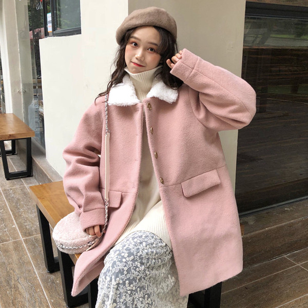 Modern női kabát zsebekkel és pehelygallérral több színben