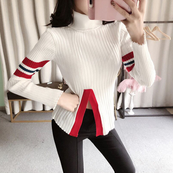 Modern női pulóver magas gallérral és színes fekete-fehér szegéllyel