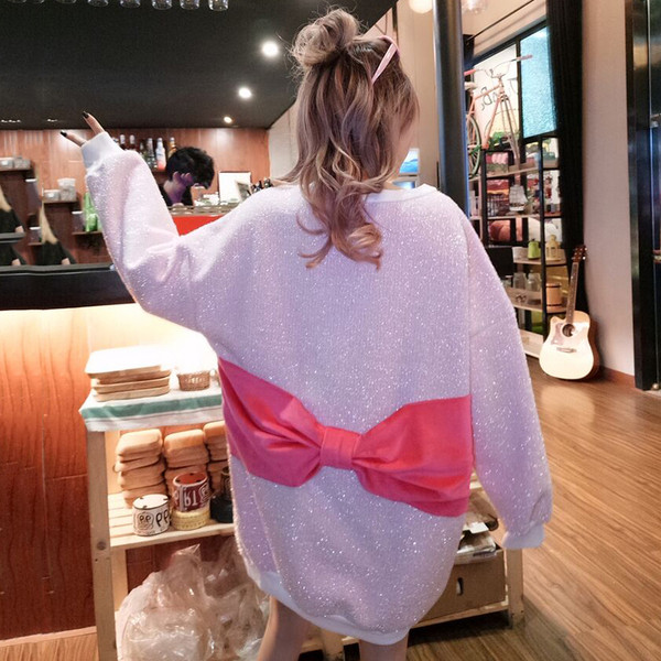 Fényes női blúz hosszú modell két színben szalaggal