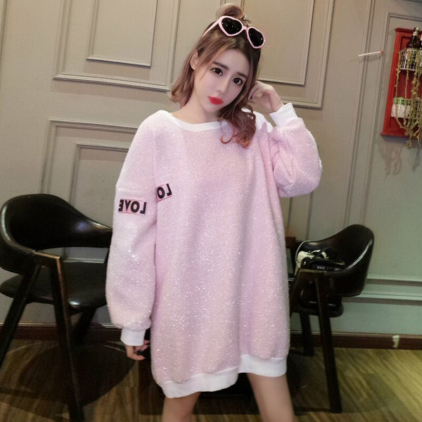 Fényes női blúz hosszú modell két színben szalaggal