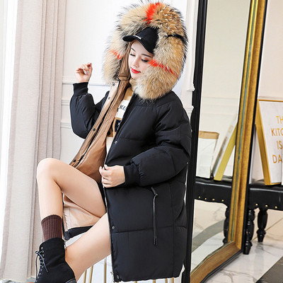 Μοντέρνο χειμωνιάτικο μακρύ γυναικείο μπουφάν με πολύχρωμο χνούδι