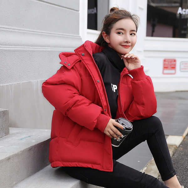 Női alkalmi kabát kapucnival és zsebekkel több színben