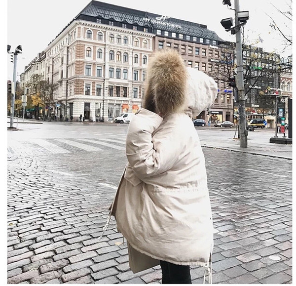 Modern női kabát pehely két színben - fehér és fekete