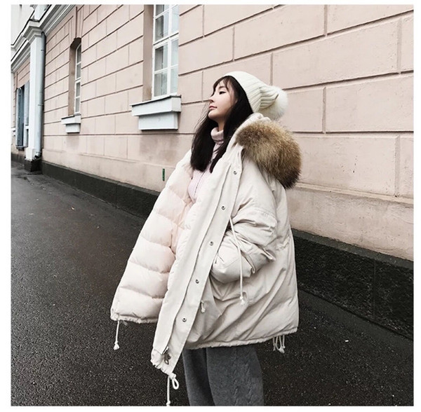 Modern női kabát pehely két színben - fehér és fekete