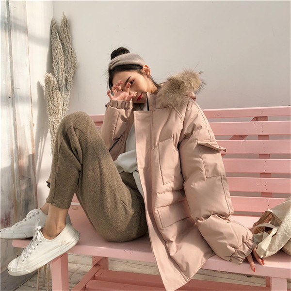 Modern női kabát - széles modell kapucnival