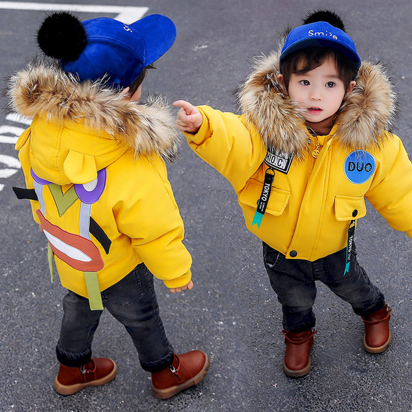 Modern, sárga színű gyerekkabát fiúknak és lányoknak egyaránt