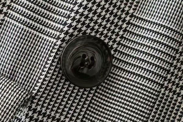 Stílusos női overál szürke övvel