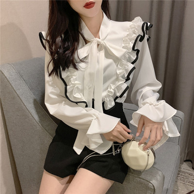 Elegáns női blúz fekete-fehér színben