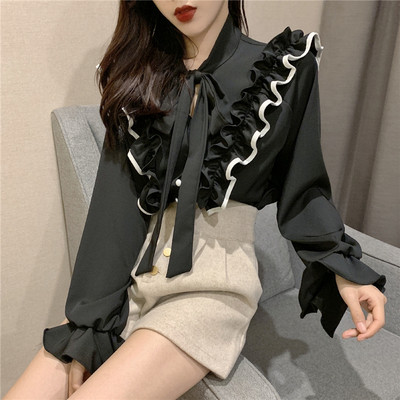 Elegáns női blúz fekete-fehér színben