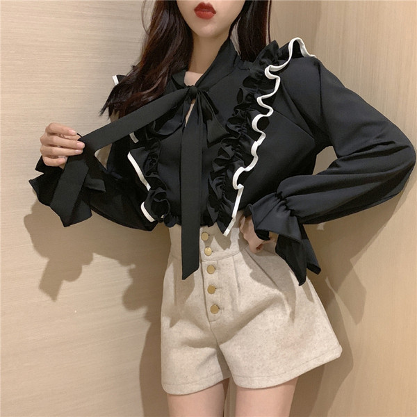 Elegáns női blúz fekete-fehér színben