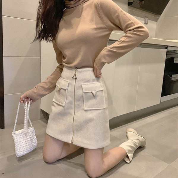 Női téli szoknya zsebekkel és cipzárral több színben