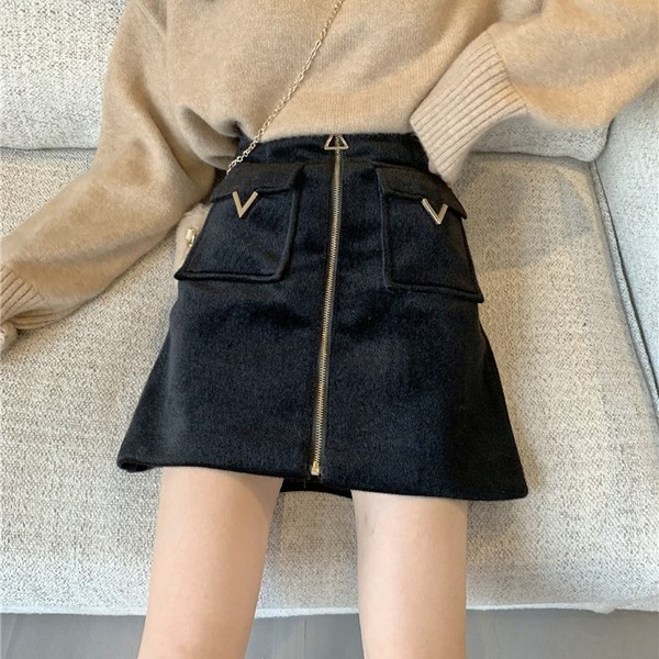 Női téli szoknya zsebekkel és cipzárral több színben